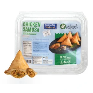 Packaged chicken samosas with one samosa outside the pack.