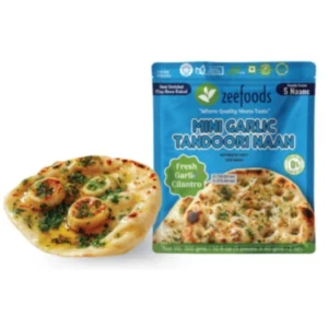 Packaged naan bread with garlic and coriander flavor beside a cooked naan.