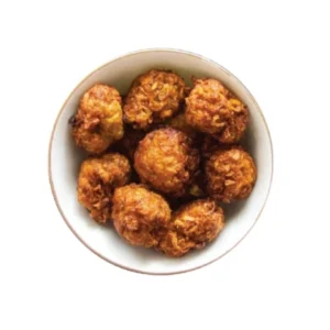 A bowl filled with crispy fried chicken pieces.