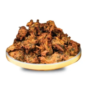 A plate piled with crispy fried chicken pieces.