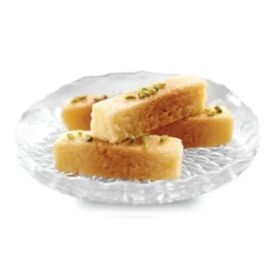 Three slices of golden pound cake on a clear glass plate.