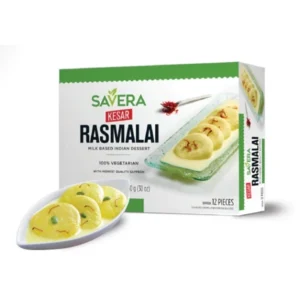 Box of Savera Rasmalai sweets with a plate of rasmalai.