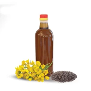 Bottle of oil with yellow flowers and seeds beside it.